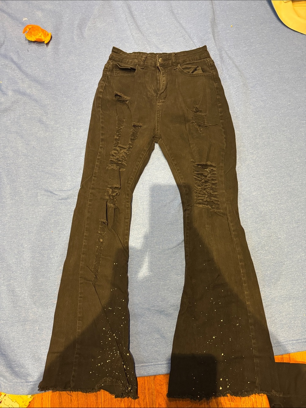 Distressed Black Flared Jeans with Ripped Details